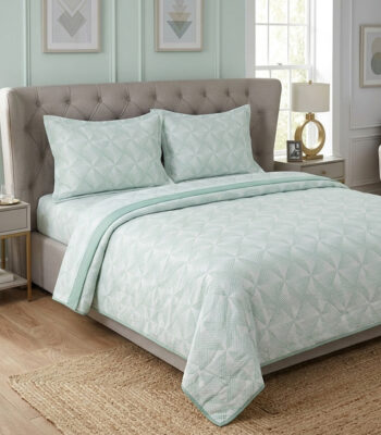 Sleep in style with this soft mint quilted coverlet — calm, clean & cozy